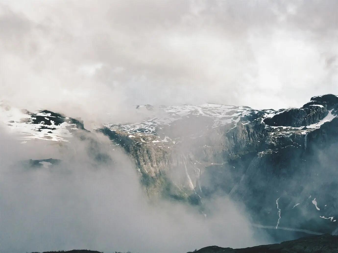 White clouds blanket the gorgeous fjords of Norway.